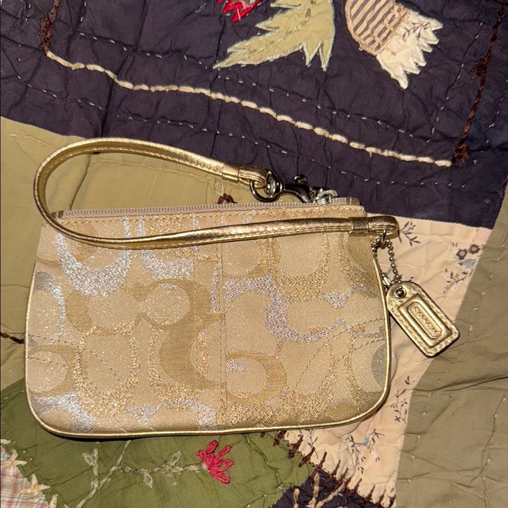 Coach vintage authentic signature wristlet gold/silver
